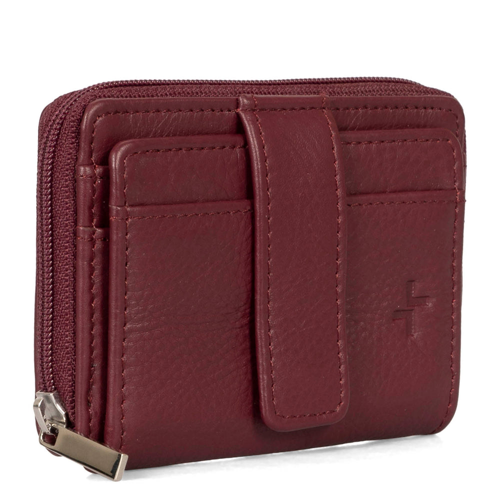 Angle view of a burgundy card holder called basics by tracker, showing its 2 front card slots, zipper, and closure strap.