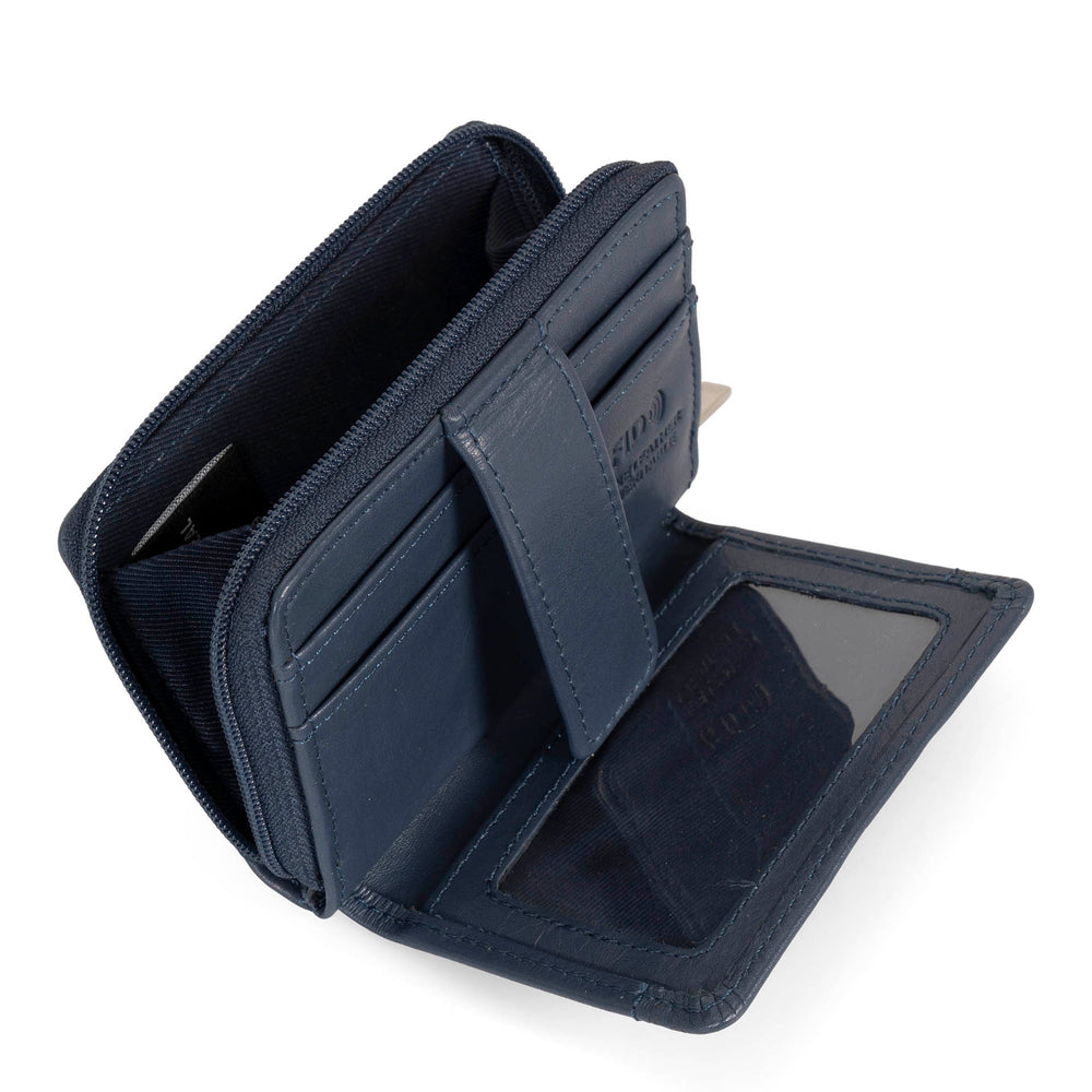 Interior view of a blue card holder called basics by tracker, showing its 2 front card slots, zipper, interior coin pocket, ID window, and closure strap.